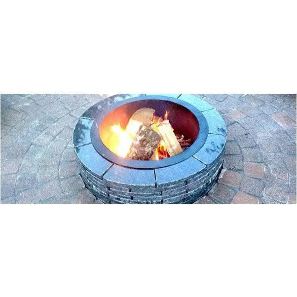 Round granite fire pit made from recycled stone with durable construction and varying colors