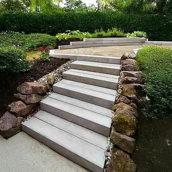 Borealis Step concrete garden step with natural wood appearance for outdoor pathways