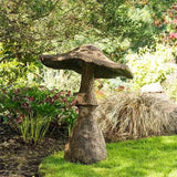 Weather-resistant garden mushroom decoration with natural stone-inspired design in a landscaped garden.
