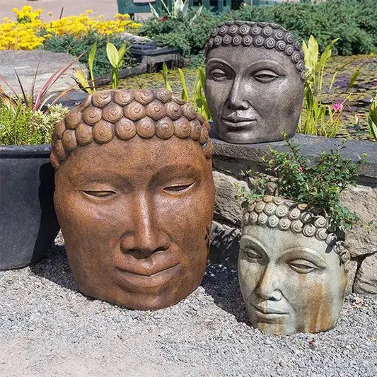Many Buddha Faces serene garden sculpture symbolizing peace and mindfulness
