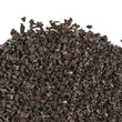 Bag of black rubber mulch made from recycled tires, ideal for landscaping and playgrounds.