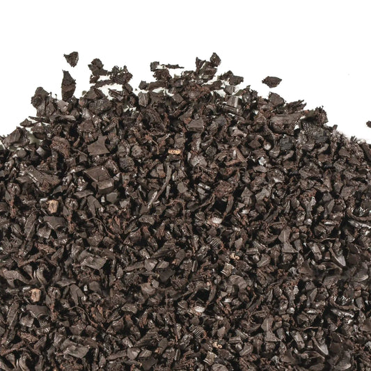 Bag of black rubber mulch made from recycled tires, ideal for landscaping and playgrounds.