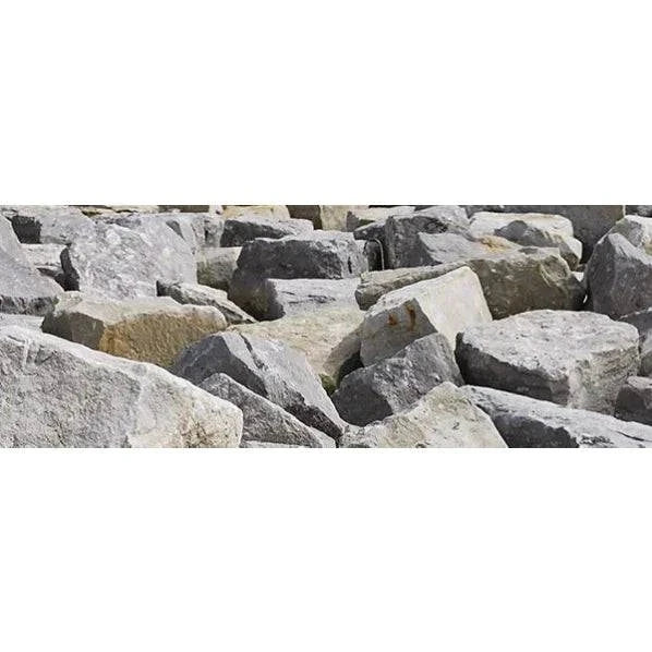 Cap Rock for retaining walls and garden edging priced at $0.18 per pound