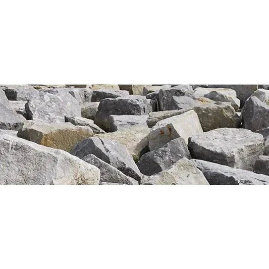 Cap Rock for retaining walls and garden edging priced at $0.18 per pound