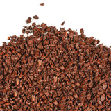 Close-up of vibrant red rubber mulch made from recycled rubber for eco-friendly landscaping and playground safety