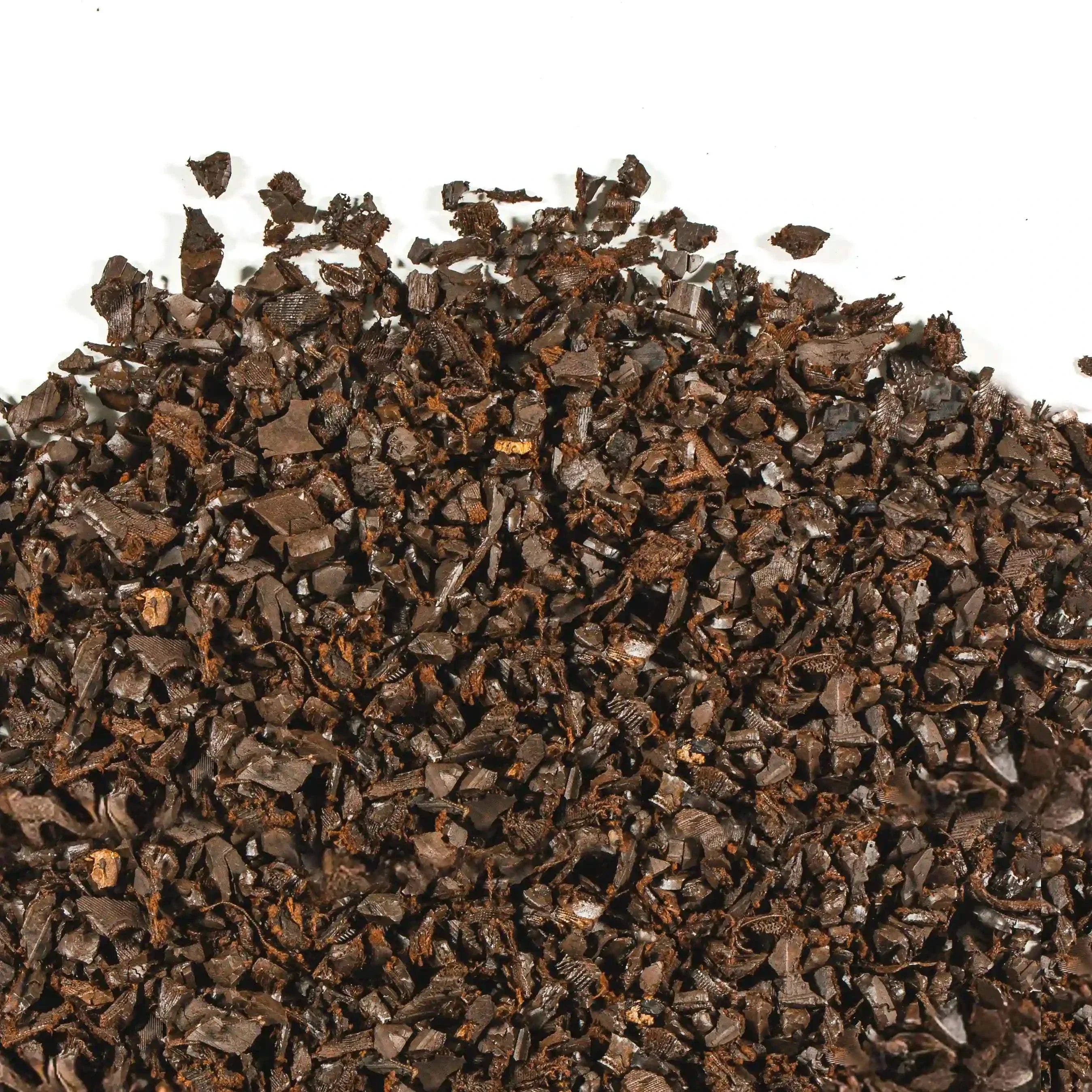 Bagged brown rubber mulch made from recycled rubber, eco-friendly and long-lasting ground cover for gardens and playgrounds