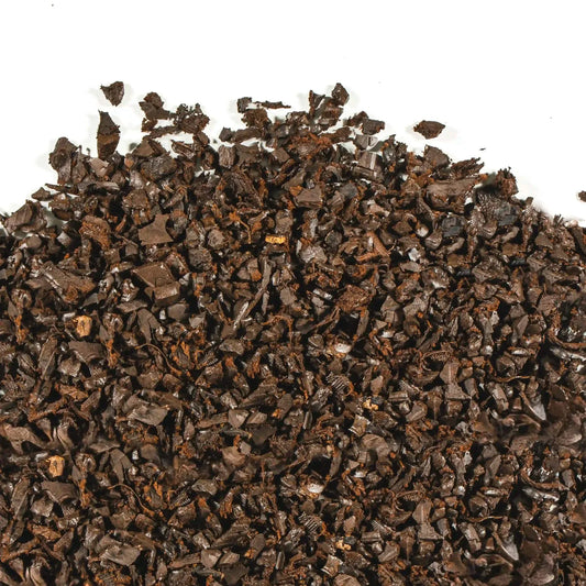 Bagged brown rubber mulch made from recycled rubber, eco-friendly and long-lasting ground cover for gardens and playgrounds