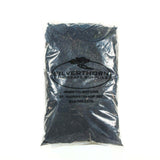 Close-up of rich black mulch with fibrous texture enhancing garden soil and suppressing weeds