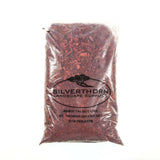 Bright red mulch made from Ontario pine wood for garden beds and pathways