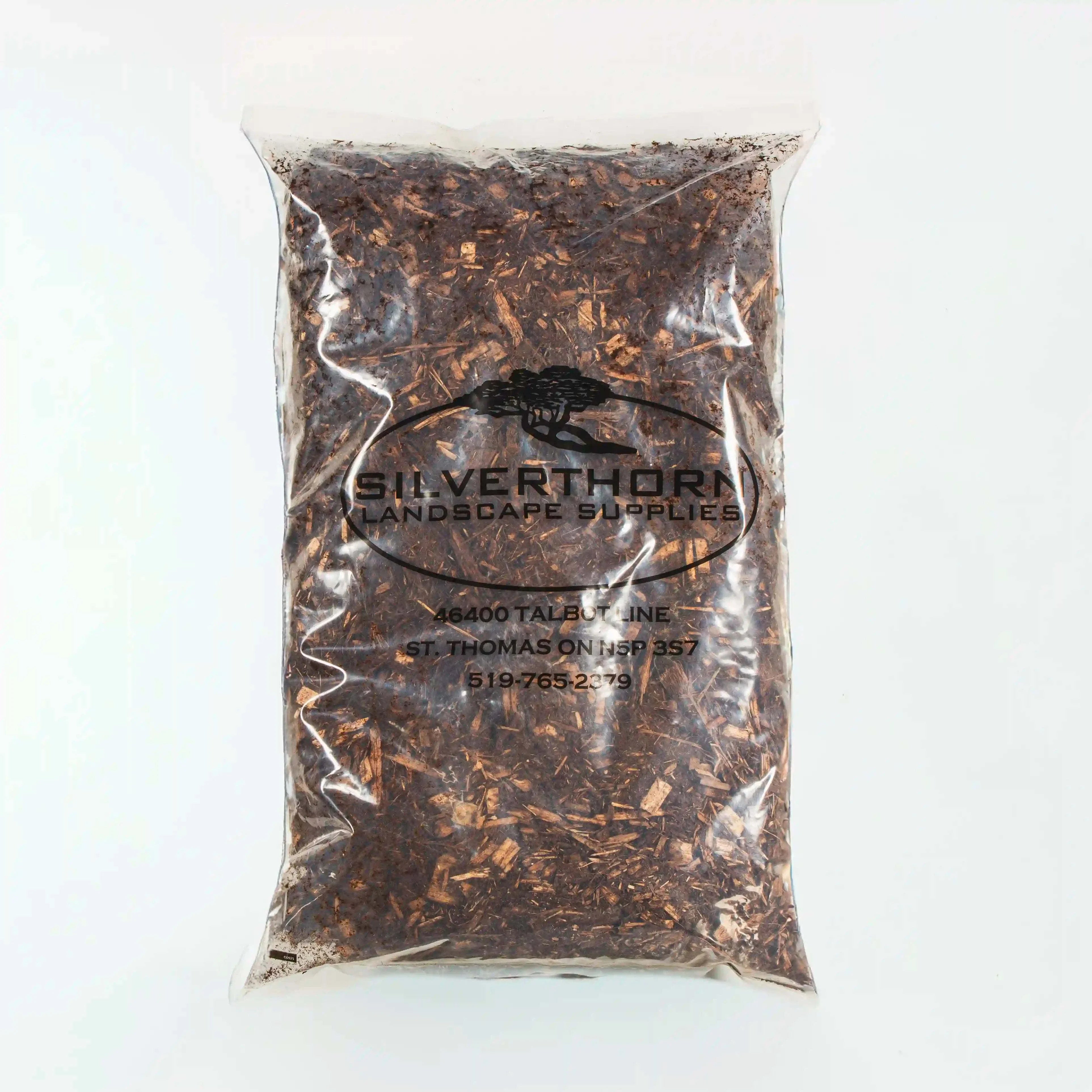 Classic Cedar Mulch made from white cedar bark with rich aroma and fibrous texture for moisture retention and weed suppression in garden beds and pathways