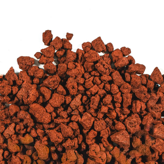 Bag of red lava rock volcanic stones for garden landscaping and drainage improvement