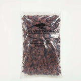 Bag of deep red lava rock stones for gardening and landscaping use