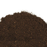 Bags of nutrient-rich mushroom compost for soil enrichment and plant growth