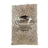 Close-up of clean, angular 5/8" crushed limestone driveway stone for durable, low-maintenance outdoor surfaces and improved drainage